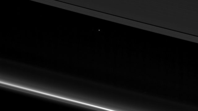 earth between saturn rings