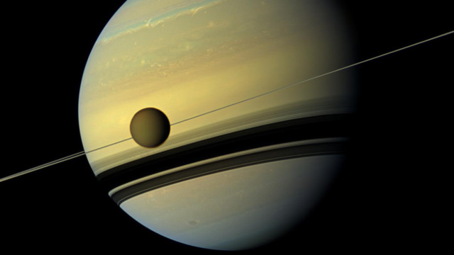 saturn moon titan drifting quicker